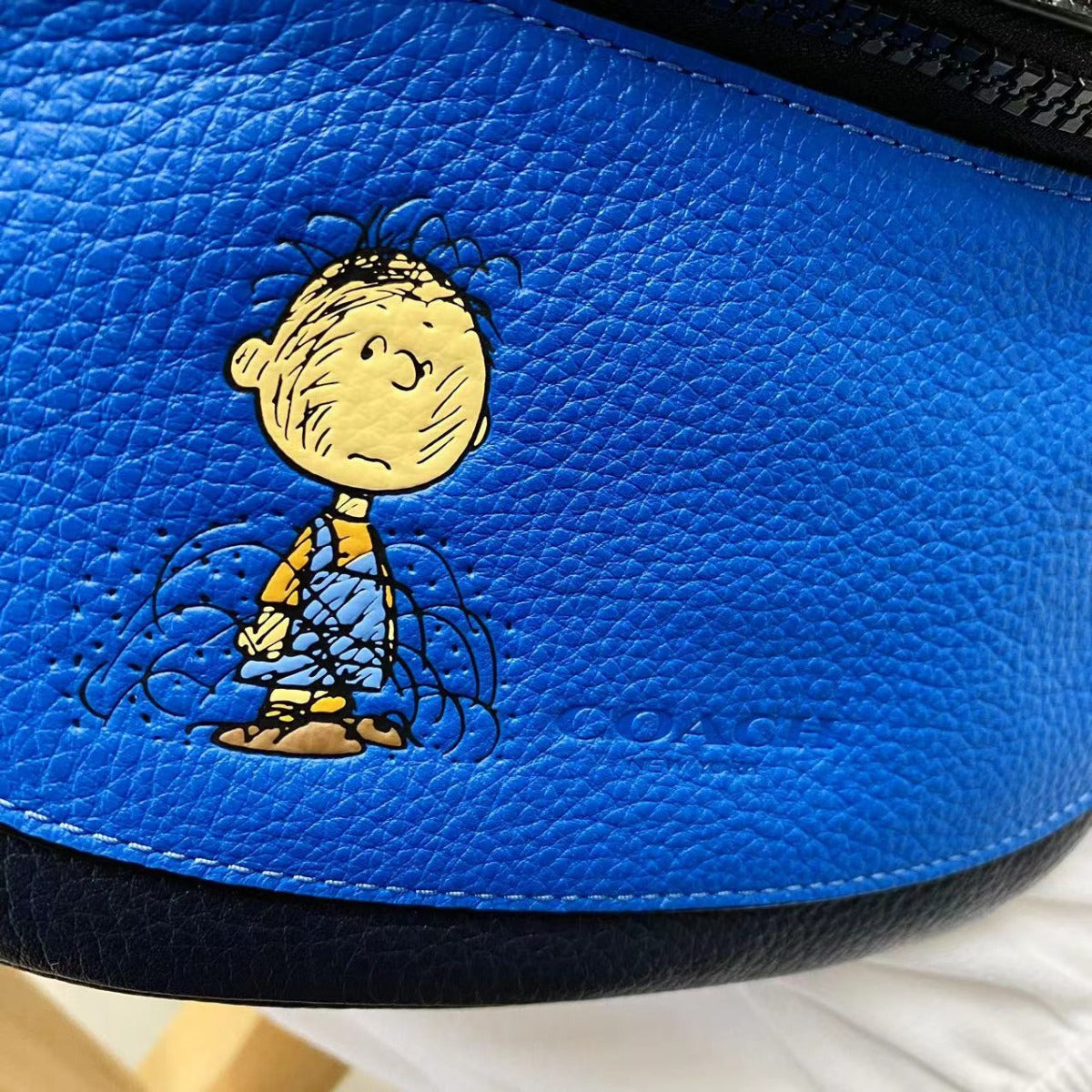 Coach 5512 X Peanuts Mini Warren Belt Bag With Pig Pen In Vivid Blue Coach 5512 X Peanuts Mini Warren Belt Bag With Pig Pen In Vivid Blue